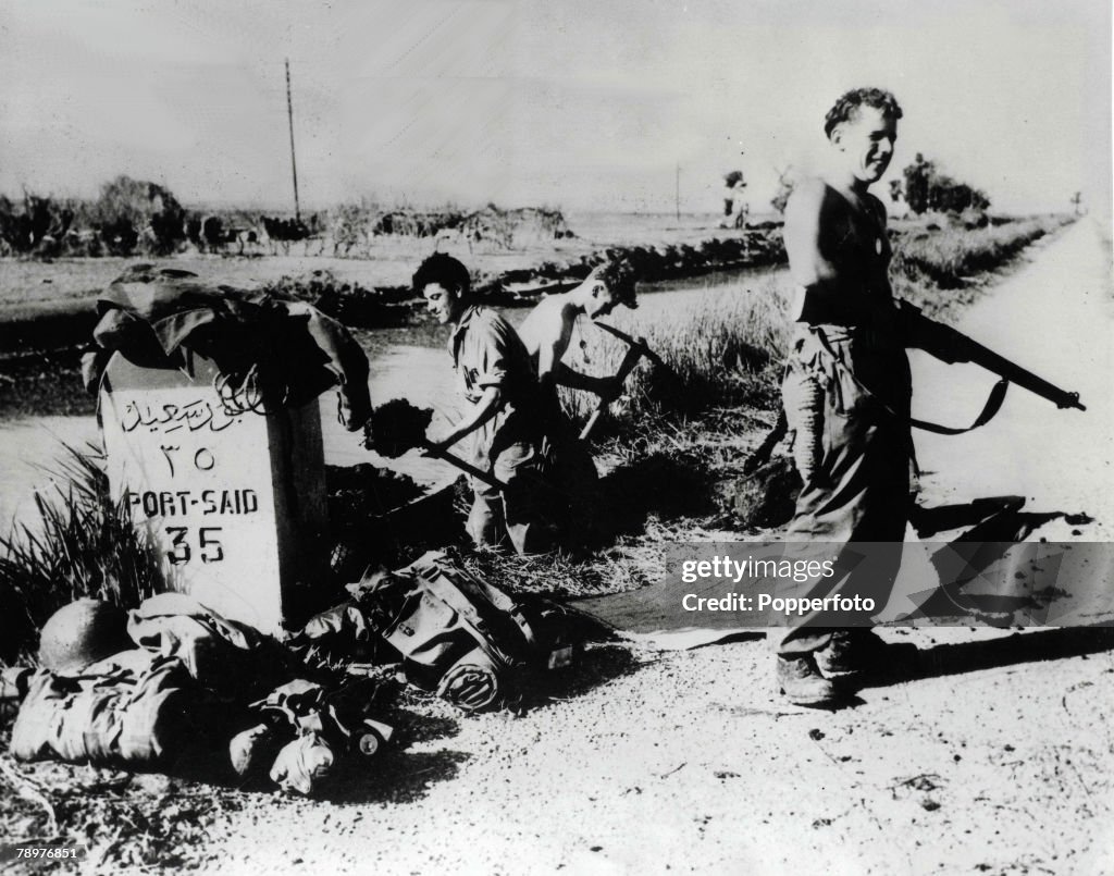 Suez Crisis. Egypt. 12th November 1956. British soldiers hold the road to Port Said at El Cap station.