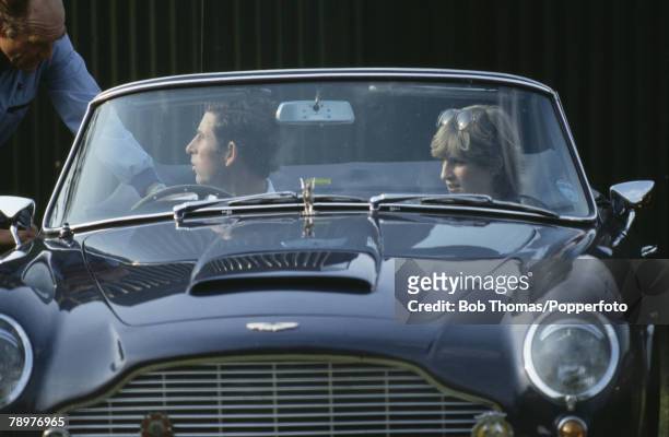 Royalty, England, Circa 1981, Prince Charles and girlfriend Lady Diana Spencer leaving a Polo match in Charles' Aston Martin sports car