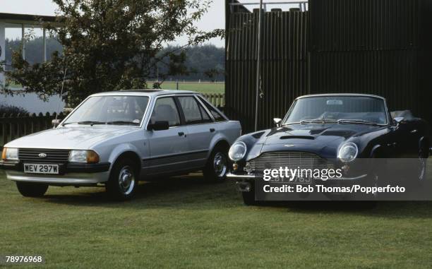 Royalty, Windsor, England 1981, Prince Charles' Aston Martin parked next to Lady Diana Spencer's Ford Escort while both were enjoying a Polo match