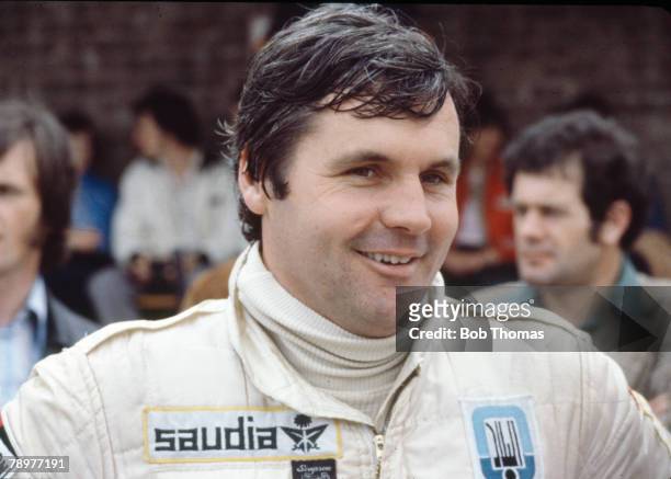 Australian racing driver Alan Jones, driver of the Albilad-Saudia Racing Team Williams FW07 Ford V8 posed in England during the 1979 FIA Formula One...