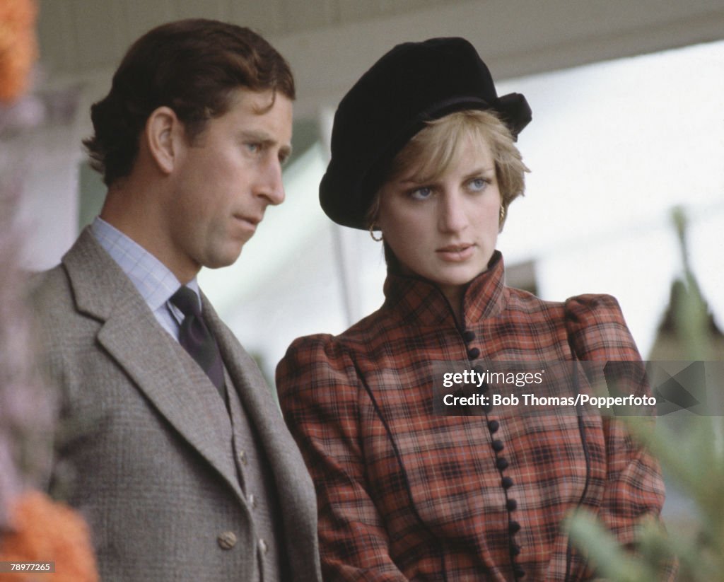 British Royalty. Braemar Games, Scotland. 1981. Prince Charles and Princess Diana watch the games.