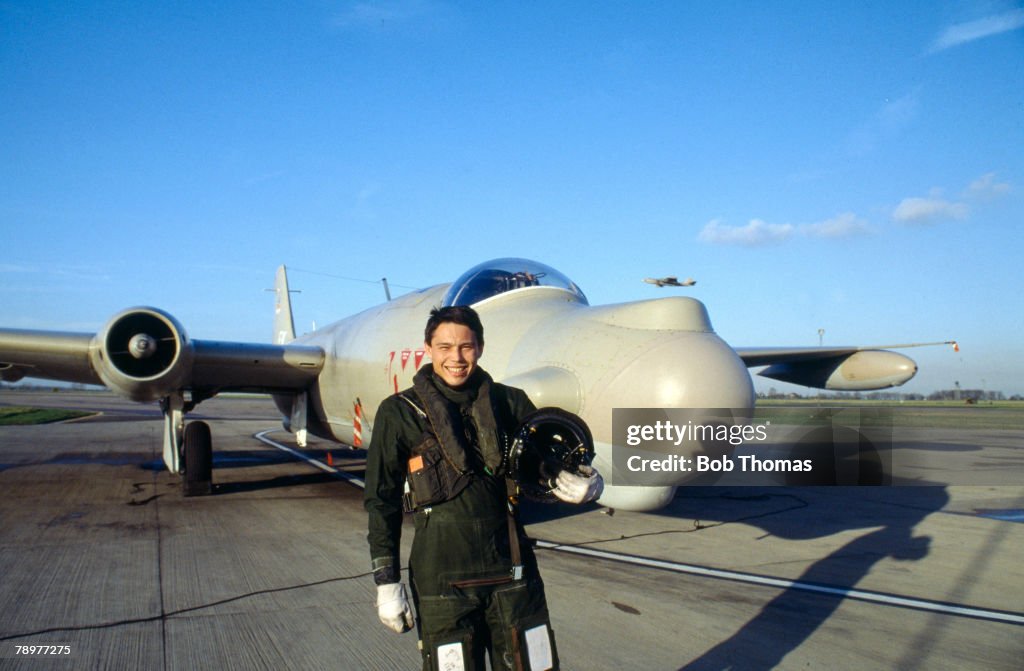 Sport. Rugby Union. pic: January 1989. RAF. Wyton, Cambridgeshire. England wing Rory Underwood, a pilot flight-lieutenant in the RAF, poses by his Canberra jet.