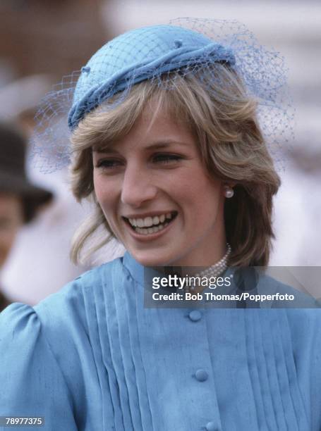 British Royalty, Tour to Australia, Canberra, 24th March 1983, Princess Diana, wearing a light blue hat and dress smiles as she tours the city