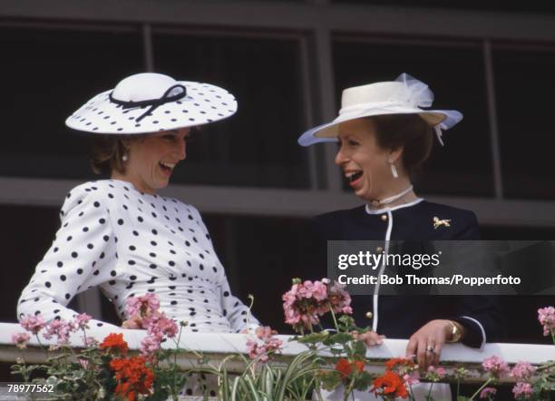 British Royalty, Horse Racing, Epsom Derby, England 1986, Princess Diana and princess Anne enjoy a funny moment from the Royal box