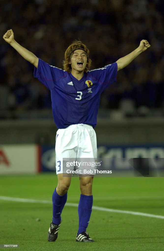 Football. 2002 FIFA World Cup Finals. Yokohama, Japan. 9th June 2002. Japan 1 v Russia 0. Japan's Naoki Matsuda raises his arms in celebration after his teams victory.