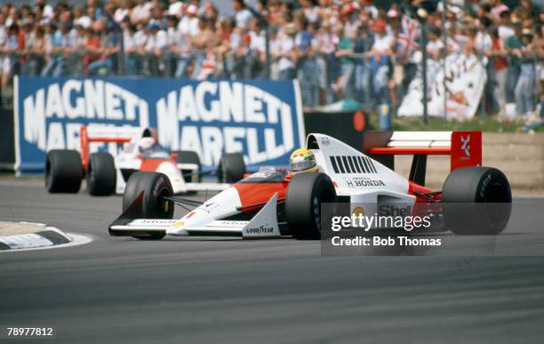 Brazilian racing driver Ayrton Senna spins the Honda Marlboro McLaren McLaren MP4/5 Honda RA109A 3.5 V10 on a bend during the 1989 British Grand Prix...