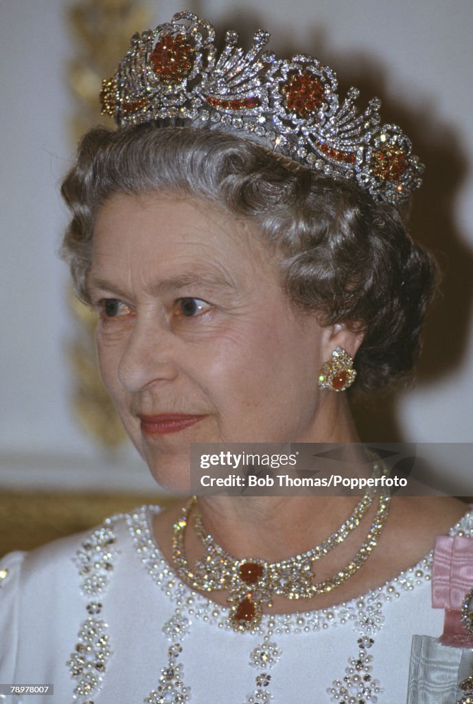 British Royalty. State visit to France. 9th June 1992. Queen Elizabeth II, wearing a diamond Tiara and jewellry while attending a dinner at the Elysee Palace.