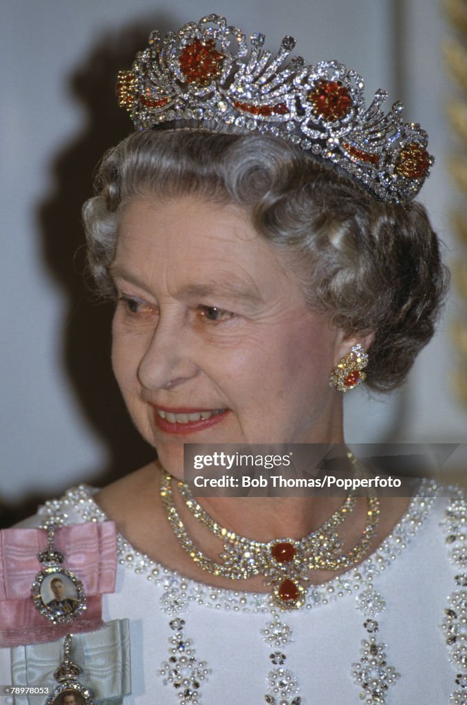 British Royalty. State visit to France. 9th June 1992. Queen Elizabeth II, wearing a diamond Tiara and jewellry while attending a dinner at the Elysee Palace.