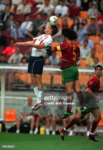 Football, 2002 FIFA World Cup Finals, Group D, Suwon, South Korea, 5th June 2002, USA 3 v Portugal 2, USA's Brian McBride wins a header against...