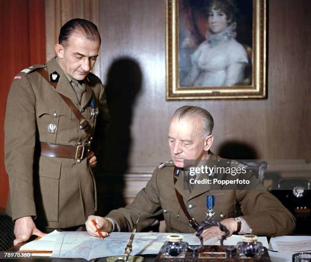 World War II, November 1942, General Wladyslaw Sikorski of Poland sits at his desk with General Tadeusz Klimecki , Chief of General staff.