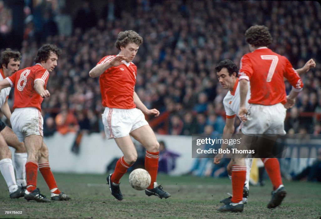 Sport. Football. pic: circa 1979. Division 1. Nottingham Forest v Liverpool. Nottingham Forest striker Tony Woodcock on the ball surrounded by players. Tony Woodcock won 42 England international caps between 1978-1986.