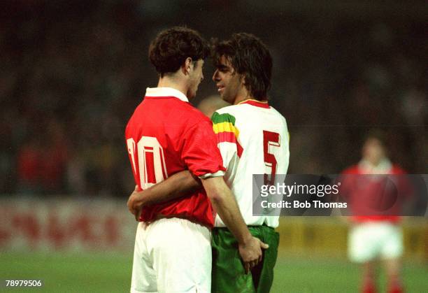 31st March 1993, World Cup Qualifier in Berne, Switzerland 1,v Portugal 1, Portugal's Peixe and Switzerland's Ciriaco Sforza in a friendly embrace