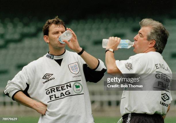 23rd May 1996, Tour Match, China 0 v England 3, England Training, England Head Coach Terry Venables, right and Bryan Robson enjoying a welcome drink...
