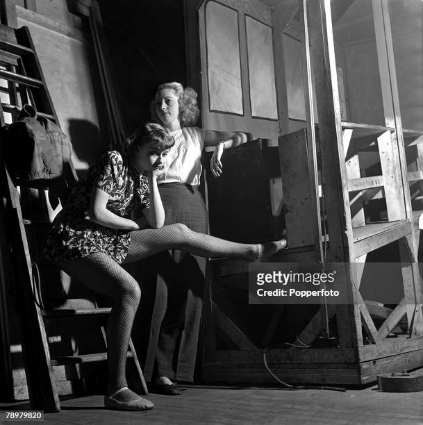 Auditioning for a part as chorus girls, are Audrey Hepburn and Babs Johnston in a new musical by Jack Hylton called "High Button Shoes"