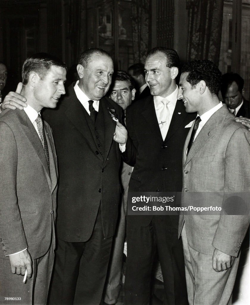 Sport. Football. pic: 1959. Madrid. Real Madrid President Santiago Bernabeu, 2nd left, with Raymond Kopa, left, and Alfredo Di Stefano and Gento at a celebration party after Real had won the European Cup for the 4th consecutive season.The French internati