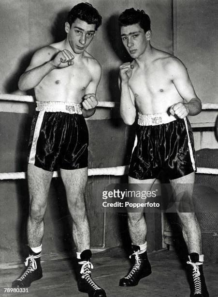 The Kray twins pictured on 23rd January 1953, when as teenagers they would report to a local gymnassium in the East End of London for boxing training...