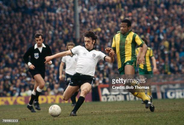 Cup Semi-Final, West Bromwich Albion v Ipswich Town, Ipswich Town;s John Wark prepares to shoot as West Bromwich Albion's Cyrille Regis challenges,...