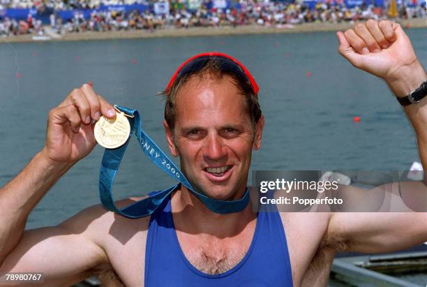 Olympic Games, Sydney, Australia, Rowing, Men's Coxless Fours Final, 23rd September Great Britain team member Steven Redgrave proudly holds his gold...