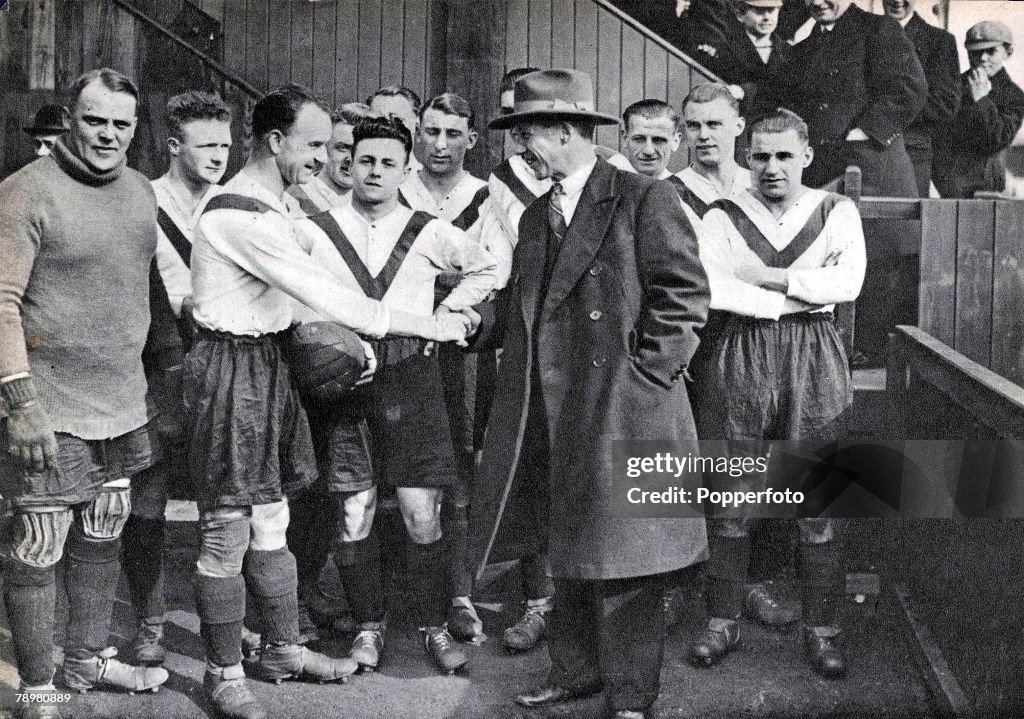 Football. 1931. London. Jimmy Seed is greeted by the players after taking over as Manager of Clapton Orient. Seed had an illustrious career as a player with Tottenham Hotspur, where he was a key member of their FA Cup winning side of 1921, and won 5 Engla