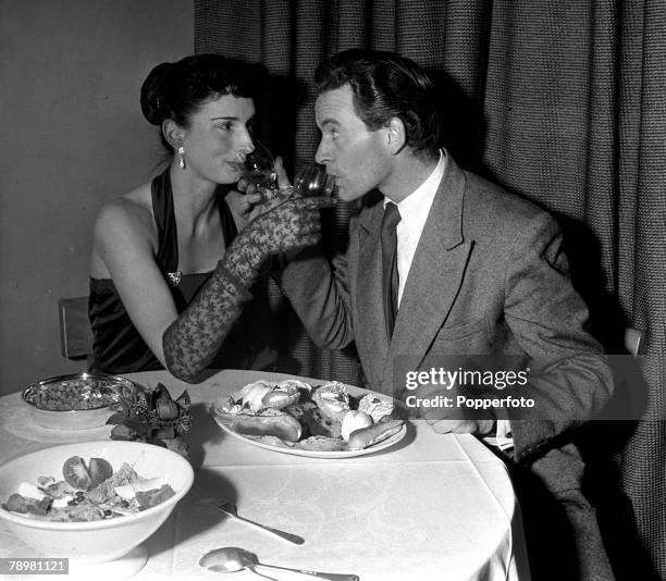 Tony Britton is pictured having a meal with his wife