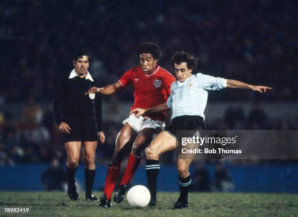 13th June 1984, England Tour of South America, Uruguay 2 v England 0 on Montevideo, England's John Barnes tangles with Uruguay's Nestor Montelongo