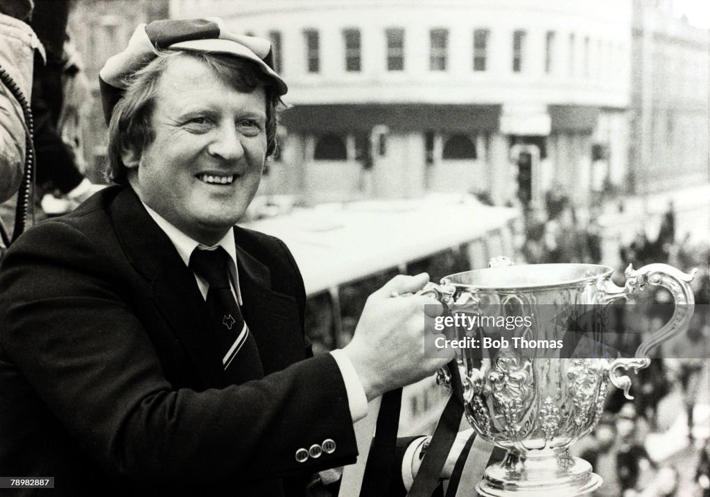 Sport. Football. pic: 1980. Wolverhampton Wanderers' Manager John Barnwell holds the League Cup during the team's victory parade throgh the streets of Wolverhampton.