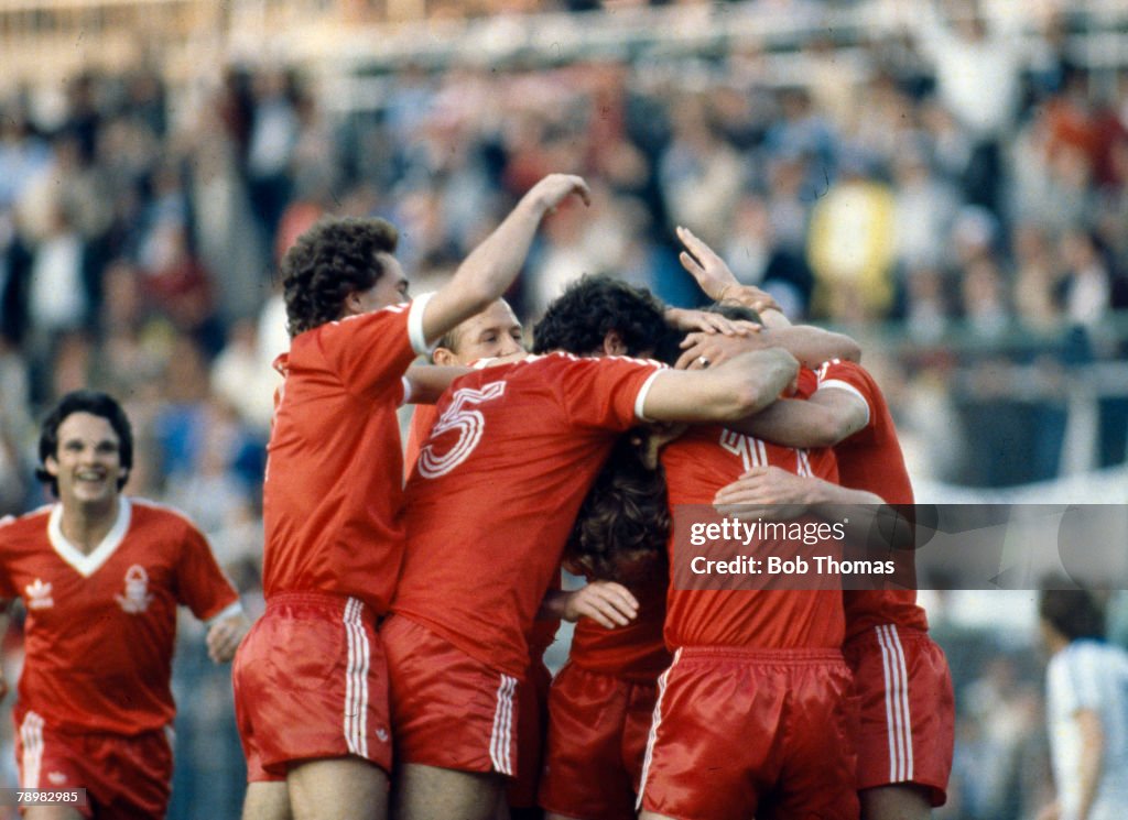 BT Sport. Football. pic: 1980. European Cup Final in Madrid. Nottingham Forest 1 v Hamburg 0. Nottingham Forest players mob John Robertson who had scored the winning goal.