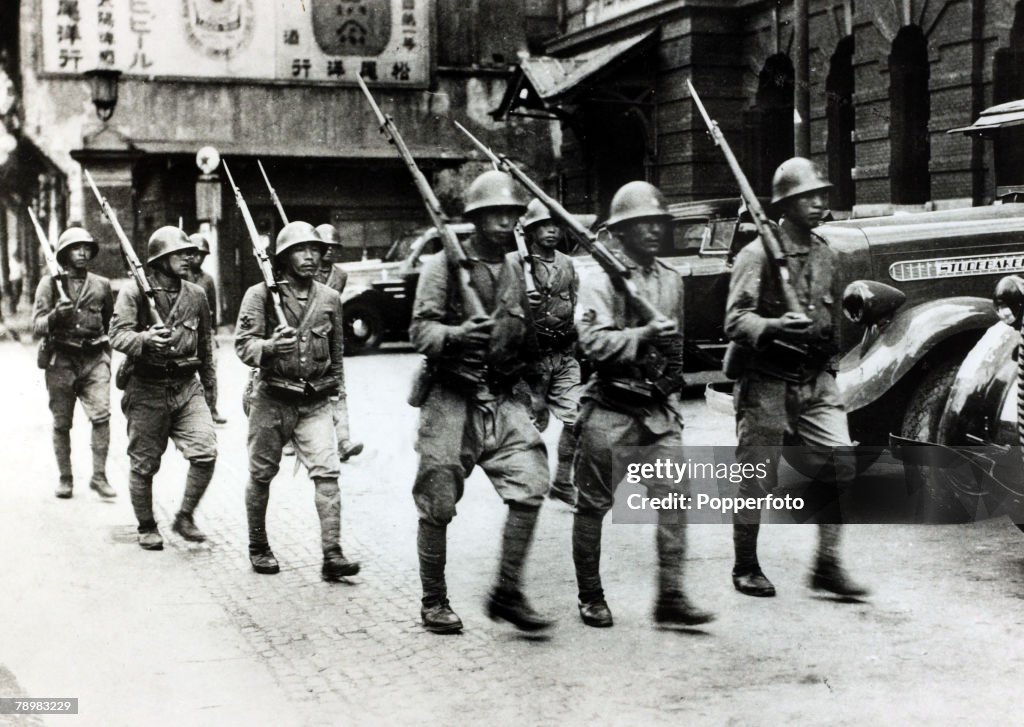 War and Conflict. 2nd Sino-Japanese War. (1937-1945). Japanese troops marching through Shanghai. Following the two countries conflict at the end of the 19th century, further hostilities developed after the Manchurian Incident of 1931 when the Japanese Arm