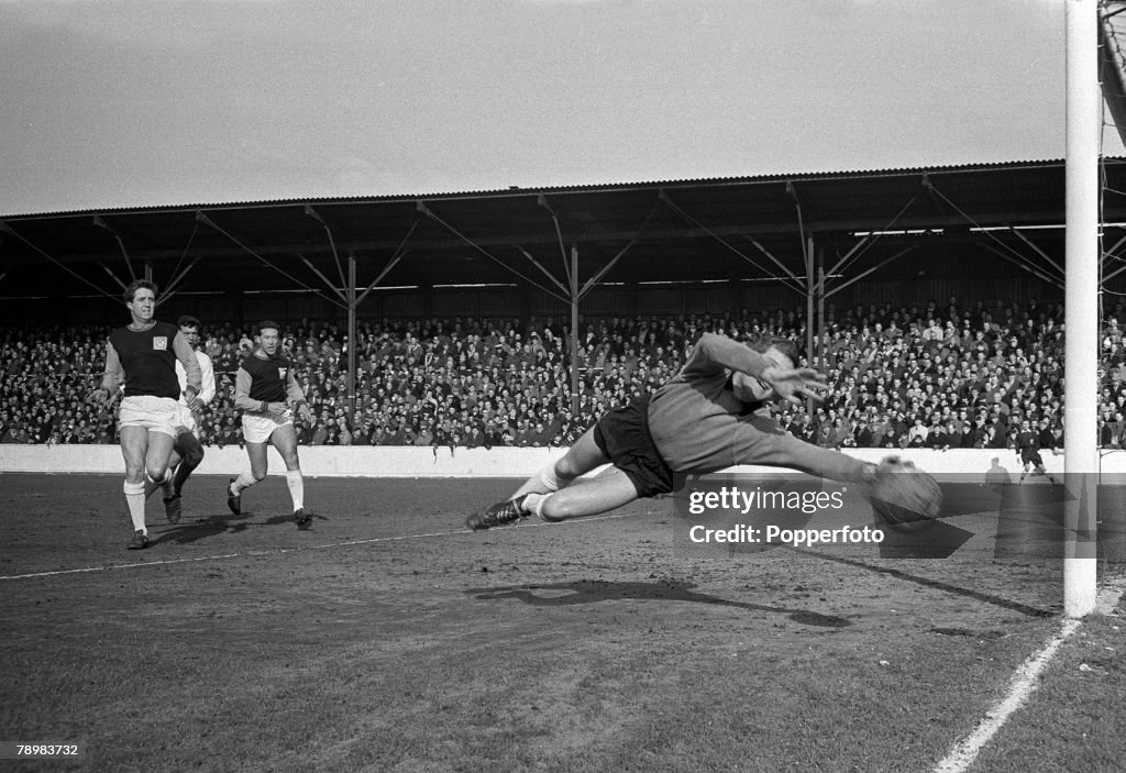 Sport. Football. pic: 7th March 1964. Division 1. West Ham United 0. v Manchester United 2. at Upton Park. West Ham United goalkeeper Jim Standen dives in vain as Manchester United score.