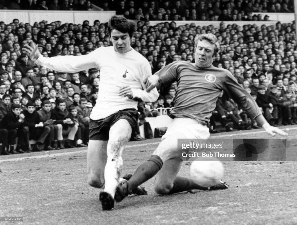 BT Sport. Football. pic: 18th January 1969. Division 1. Tottenham Hotspur v Leeds United. Tottenham Hotspur's Cyril Knowles and Leeds United's Mick Jones, right battle for the ball.