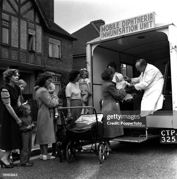 The National Health Service at work in Portsmouth, a mobile immunization van has reduced the risk of diptheria cases from 776, twenty years ago to 1...