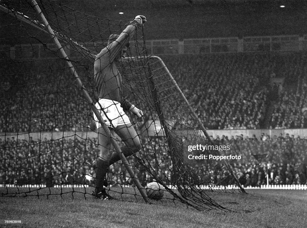 Sport. Football. pic: 12th August 1967. F.A.Charity Shield. at Old Trafford. Manchester United.3. v Tottenham Hotspur.3. Manchester United goalkeeper Alex Stepney retrieves the ball from his net after rival goalkeeper Tottenham Hotspur's Pat Jennings had 