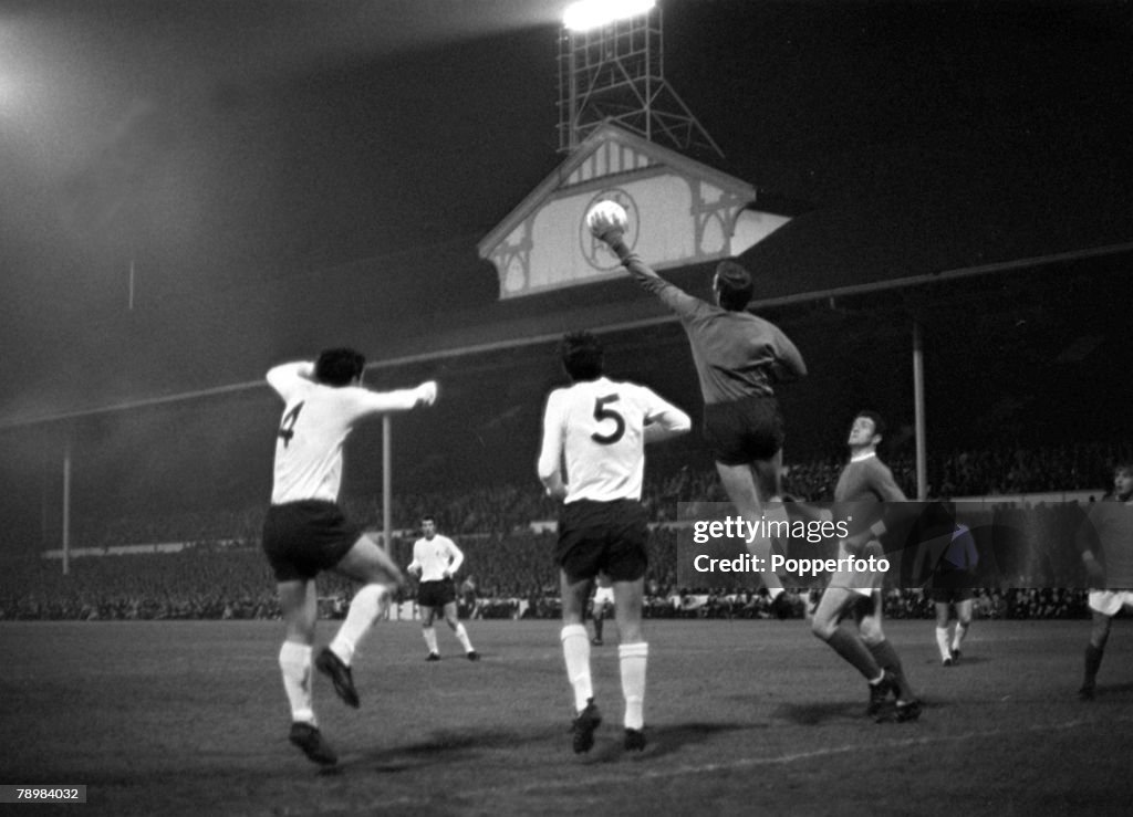 Sport. Football. pic: 9th October 1968. Division 1. Tottenham Hotspur 2. v Manchester United 2. at White Hart Lane. Tottenham Hotspur goalkeeper Pat Jennings palms the ball away watched by Manchester United's Bill Foulkes.