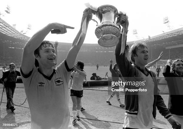 Cup Final at Wembley, Arsenal 3,v Manchester United 2, Arsenal captain Pat Rice, left, and David Price parade the F.A. Cup on the lap of honour