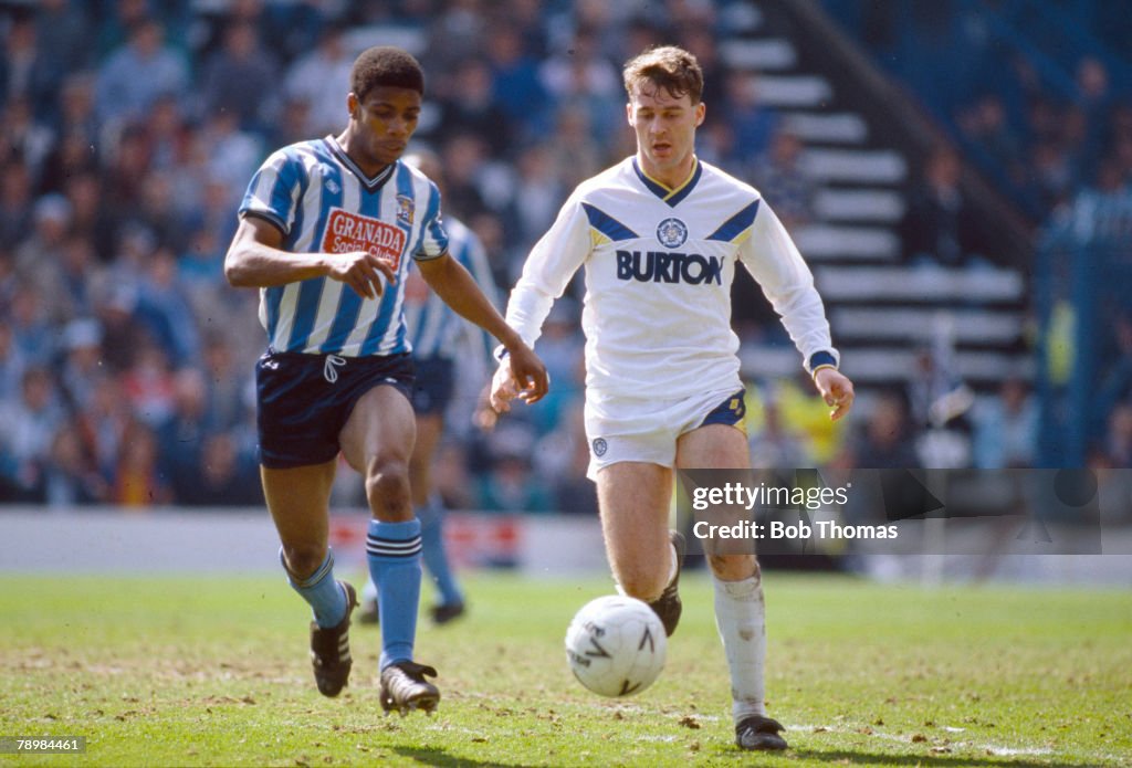 Sport. Football. FA Cup Semi-Final at Hillsborough. Coventry City 3 v Leeds United 2 a.e.t. pic: 12th April 1987. Leeds United's John Sheridan, right, is challenged by Coventry City's Lloyd McGrath.