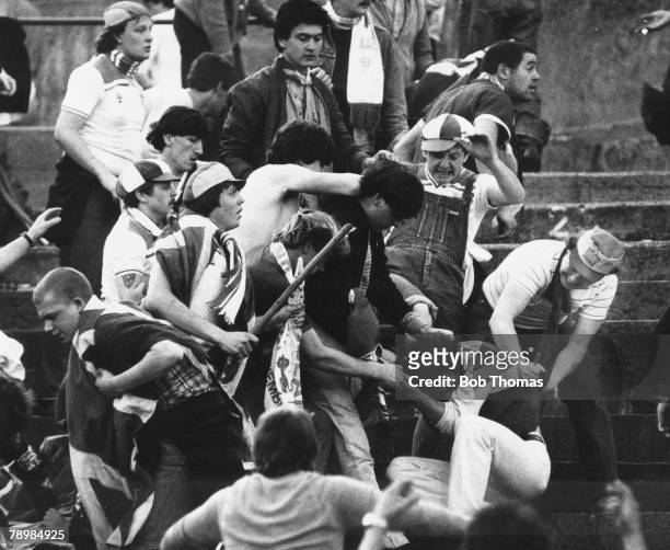 Football, World Cup Qualifier, Basle, 30th May 1981, Switzerland 2 v England 1, A Swiss fan is stabbed in the back by an English hooligan during the...
