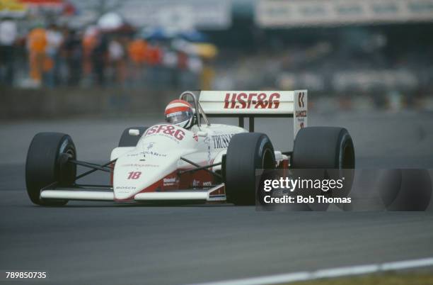 American racing driver Eddie Cheever drives the USF&G Arrows Megatron Arrows A10 Megatron Straight-4t in the 1987 British Grand Prix at Silverstone...