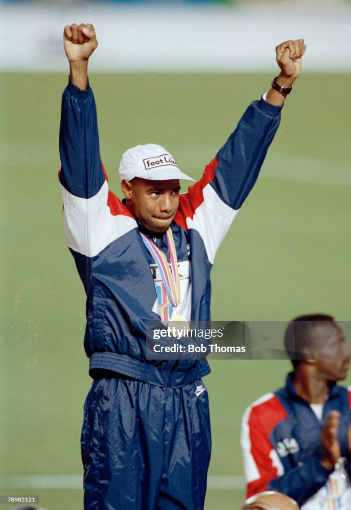Sport. Athletics. pic: 1991. 3rd World Athletics Championships in Tokyo. Mens Long Jump Final. Mike Powell, USA, the Gold Medal winner with a new world record, celebrates on the podium.