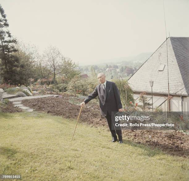 German politician, statesman and former Chancellor of West Germany, Konrad Adenauer pictured standing in the garden of a house in Germany circa 1966.
