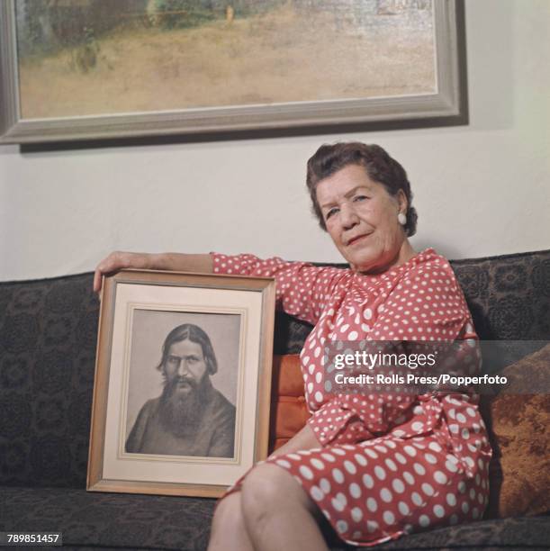 Maria Raspatelly Maria Rasputin pictured holding a portrait of her father Grigori ...