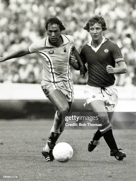 September 1976, Division 1, Coventry City v Manchester United, Coventry City's John Beck and Manchester United's Jimmy Nicholl in a race for the ball