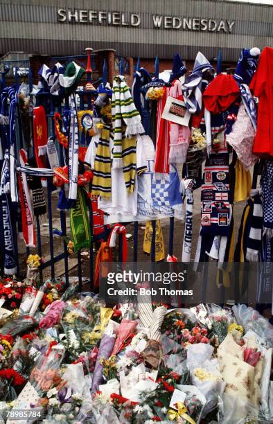 Hillsborough Tragedy, Scarves and flowers at the gates to Hillsborough Stadium, Sheffield in memory of the great loss of life which took place in the...