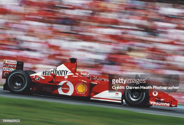 Michael Schumacher of Germany drives the Scuderia Ferrari Marlboro Ferrari F2002 Ferrari V10 to victory in the Formula One German Grand Prix on 28...