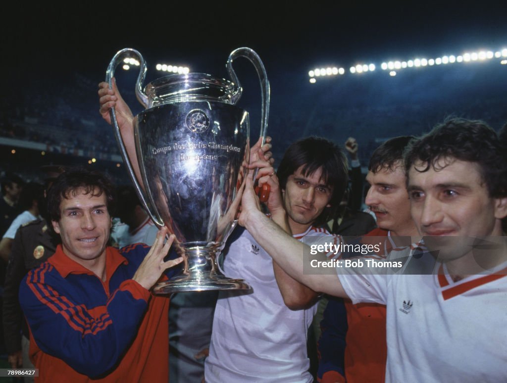 Sport. Football. European Cup Final. Seville. 7th May 1986. Steaua Bucharest 0 v Barcelona 0 ( After Extra Time) Steaua won 2 - 0 on penalties. Bucharest ( including Lacatus, centre back) celebrate with the trophy.