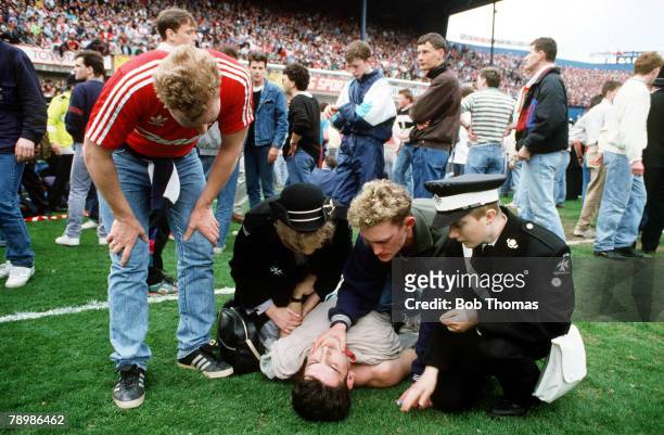 15th April 1989, F.A. Cup Semi-Final at Hillsborough, Liverpool 0,v Nottingham Forest 0, Match Abandoned, A Liverpool fan receives medical attention