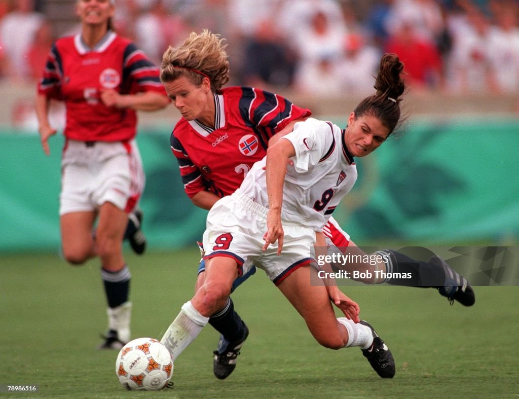 1996 Olympic Games. Atlanta, USA. Sanford Stadium, Georgia. Women's Football. Semi Final. USA 2 v Norway 1. Norway's Agente Carlsen fouls USA's Mia Hamm, leading to her being sent off.
