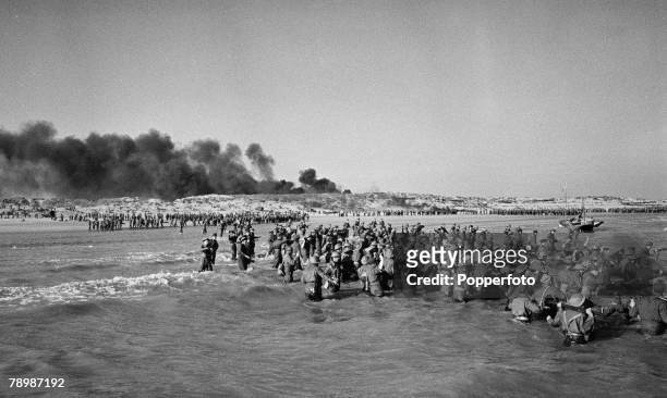Stage & Screen, Camber Sands, England The beaches packed with 'soldiers' wading out into the sea during Ealing Studios film reconstruction of the...
