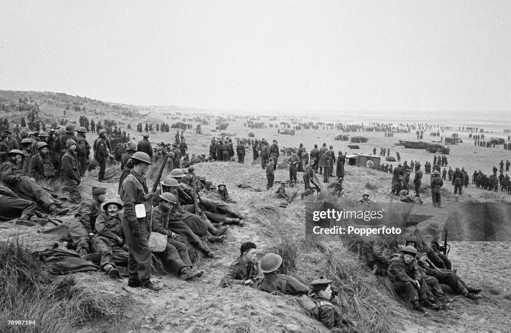 Stage & Screen. Camber Sands, England. 1957. The beaches packed with 'soldiers' during Ealing Studios film reconstruction of the evacution of the Dunkirk beaches from World War Two.