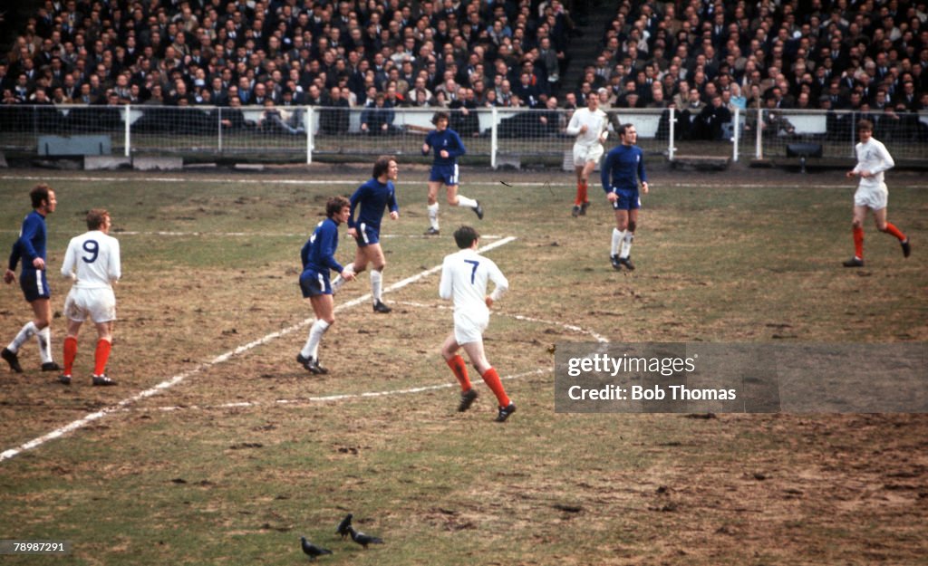 Football. 1970 FA Cup Final. Wembley. 11th April, 1970. Chelsea 2 v Leeds United 2. Action during the match showing pigeons feeding on the terrible Wembley pitch.