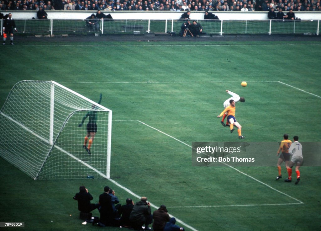 Football. 1968 FA Cup Final. Wembley Stadium. 18th May, 1968. West Bromwich Albion 1 v Everton 0. An Everton defender and WBA attacker jump up for the ball in the Everton penalty area.